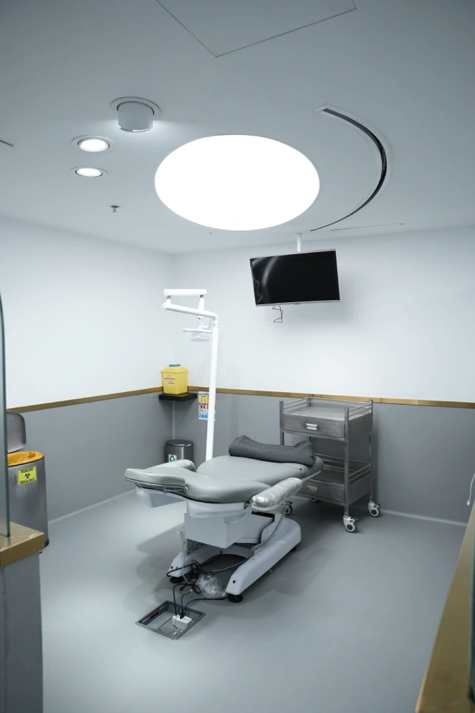 Hair transplant treatment chair under surgical lights at Padra Clinic in dubi