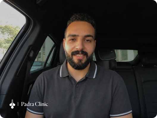 Male patient discussing his hair transplant results at Padra Clinic