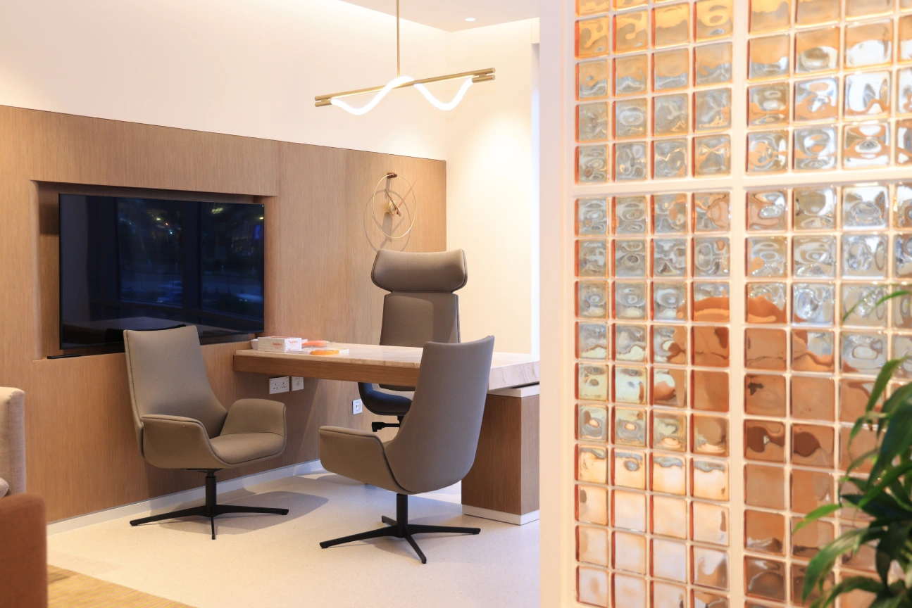Padra Clinic reception desk with staff assisting a patient